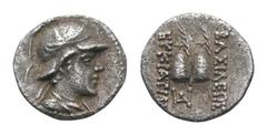 Baktria, Greco-Baktrian Kingdom. Eukratides I Megas AR Obol. Circa 170-145 BC. Diademed, helmeted and draped bust right / Piloi of the Dioskouroi, each surmounted by star and accompanied by palm; mono