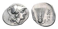 Lucania, Metapontion AR 1/2 Shekel. Punic occupation, circa 212-207 BC. Head of Athena to right wearing crested Corinthian helmet / Ear of barley with leaf to left; META in right field. Robinson, Puni