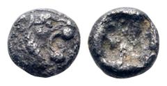 Uncertain Western Asia Minor AR Tetartemorion. Mid to Late 5th century BC. Head of roaring lion right / Rough incuse square. Unpublished in the standard references, cf. CNG e-sale 269, 2011, 136. 0.18