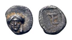 Ionia, Kolophon AR Tetartemorion. Circa 450-410 BC. Facing head of Apollo / TE monogram in incuse square. SNG Kayhan 356. 0.24g, 7mm, 7h. Very Fine. Rare.