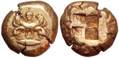 Mysia, Kyzikos EL Stater. Circa 500-450 BC. Double-bodied winged sphinx standing with head facing atop tunny fish to right, wearing ouraios, hair falling in plaited locks behind / Quadripartite incuse