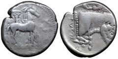 Sicily, Gela AR Tetradrachm. Circa 465-450 BC. Charioteer driving slow quadriga right, Ionic column behind, wreath before, ear of corn in exergue / Forepart of man-headed bull (river-god Gelas) with l