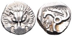 Dynasts of Lycia, Perikles AR Third Stater. Circa 380-360 BC. Facing lion’s scalp / Triskeles; Dolphin right in upper field; Female head facing in lower left field; legend around. SNG Copenhagen -; SN