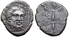 Etruria, Populonia AR 20 Asses. 3rd century BC. Bearded head of Tinia facing three-quarters right, open wreath (of ivy?) suspended above, ties hanging loose to either side; X on either side of forehea