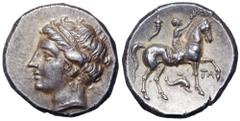 Calabria, Tarentum AR Nomos. Campano-Tarentine issue. Circa 281-228 BC. Diademed head of the nymph Satyra left wearing triple-drop earring / Nude youth on horseback right, crowning horse with raised l