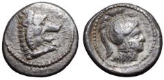 Lycia, Xanthos AR Stater. Circa 400-370 BC. Head and forepaw of roaring lion right with protruding tongue / Head of Athena right, wearing plain Attic crested helmet with raised cheek guard, diskeles a