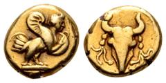 Ionia, uncertain mint. EL 1/12 Stater. Circa 5th Century BC. Siren standing right, holding tympanon (tambourine) / Bukranion with fillets hanging from each horn. Rosen 369. 1.00g, 7mm, 10h. Good Very 