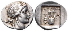 Lycia, Tlos as member of the Lycian League AR Drachm. Circa 167-100 BC. Laureate head of Apollo right; bow and quiver over shoulder / Kithara; T-Λ; Helmet to lower left. Troxell 12.1. 2.56g, 16mm, 12h