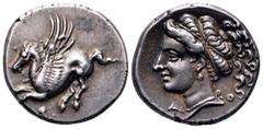 Corinthia, Corinth AR Drachm. Circa 308-307 BC. Pegasos flying left, Q below / Head of Aphrodite left, wearing earring and necklace, hair tied with ribbon and bound at top, falling loose behind; Δ-O a