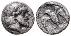 Ionia, Magnesia ad Maeandrum AR Tetartemorion. Archepolis. Circa 459 BC. Bearded male head right, wearing laurel wreath / Eagle flying left in dotted square within incuse square. Nollé & Wenninger 2a 