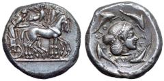 Sicily, Syracuse AR Tetradrachm. Deinomenid Tyranny. Time of Hieron I, circa 475-470 BC. Charioteer, holding kentron and reins, driving walking quadriga right; above, Nike flying to right, crowning ho