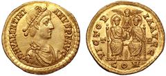 Valentinian II AV Solidus. Trier, AD 375-392. D N VALENTINIANVS P F AVG, pearl-diademed, draped and cuirassed bust right / VICTORIA AVGG, two nimbate emperors enthroned facing, holding globe between t