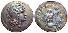 Attica, Athens AR New Style Tetradrachm. Circa 154-3 BC. Head of Athena right, wearing crested Attic helmet decorated with vine tendril and Pegasos / Owl standing right, head facing, on amphora; AΘE a