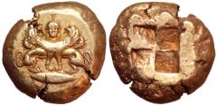 Mysia, Kyzikos EL Stater. Circa 500-450 BC. Double-bodied winged sphinx standing with head facing atop tunny fish to right, wearing ouraios, hair falling in plaited locks behind / Quadripartite incuse
