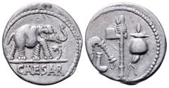Julius Caesar AR Denarius. Military mint travelling with Caesar, 49-48 BC. Elephant advancing right, trampling on serpent; CAESAR in exergue / Emblems of the pontificate: simpulum, aspergillum, securi