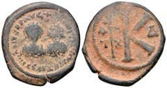 Justin I, with Justinian I, Æ Half Nummus. Antioch, AD 527. D N D N IVSTINVS ET IVSTINIANVS P P AVG, diademed, draped and cuirassed busts of Justin and Justinian facing; cross above / Large K; to left