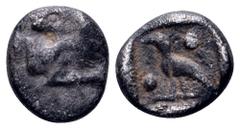 Caria, Mylasa(?) AR Tetartemorion. Circa 420-390 BC. Milesian standard. Forepart of lion right, head reverted / Bird standing left, pellet above right and below left; all within incuse square. Cf. SNG