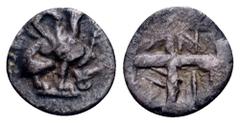 Greek Ionia, Teos AR Tetartemorion. Circa 460-420 BC. Griffin seated right, raising forepaw; symbol before(?) / Quadripartite incuse square. Cf. SNG Kayhan 600-1. 0.25g, 8mm. Very Fine.