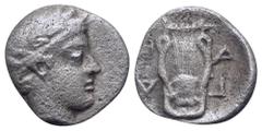 Greek Thessaly, Pagasai AR Hemiobol. Circa 350 BC. Laureate head of Apollo Pagasaios to right / Π-Α Γ-Α, six-stringed lyre; all within shallow incuse circle. BCD Thessaly I 1223. 0.32g, 8mm, 10h. Very