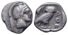 Greek Attica, Athens AR Hemiobol. Circa 500-485 BC. Helmeted head of Athena right / Owl standing right; olive sprig above. Kroll 14; SNG Copenhagen 59-61. 0.65g, 7mm, 10h. Very Fine.