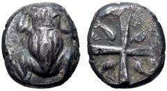 Greek Cyclades, Seriphos AR Stater. Thraco-Macedonian standard. Circa 475-460 BC. Frog, as seen from above / Shallow quadripartite incuse square, each quadrant containing a dolphin; uncertain retrogra