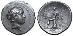 Greek Seleukid Empire, Antiochos the son of Seleukos IV AR Tetradrachm. Antioch, circa 175 BC. Diademed head right / Apollo Delphios seated left on omphalos, testing arrows and resting on grounded bow