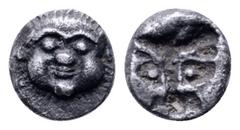 Greek Thraco-Macedonian Region, uncertain mint AR Hemiobol. Mid 5th-4th century BC. Facing head of gorgoneion / Incuse head of lion or panther facing. Unpublished in the standard references. 0.36g, 5m