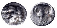 Greek Thraco-Macedonian Region, uncertain mint AR Hemiobol. Circa 500-450 BC. Ram's head left / Kantharos within incuse square. Tzamalis 49. 0.22g, 6mm, 12h. Very Fine.