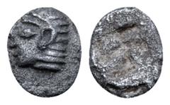 Greek Ionia, Kolophon AR Tetartemorion. Circa 530-500 BC Archaic head of Apollo left / Irregular incuse square punch. SNG Kayhan 343; SNG Copenhagen -; SNG von Aulock 1810. 0.15g, 5mm. About Good Very