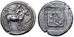 Greek Macedon, Mende AR Tetradrachm. Circa 425 BC. Dionysos, bearded, wearing himation and holding kantharos, reclining to left on the back of a donkey standing to right; before, a crow standing on br