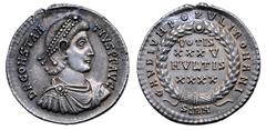 Roman Imperial Constantius II AR Heavy Miliarense. Sirmium, AD 359-61. D N CONSTANTIVS P F AVG, pearl-diademed, draped and cuirassed bust right / GAVDIVM POPVLI ROMANI around wreath, within which VOTI