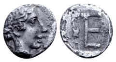 Greek Ionia, Kolophon AR Tetartemorion. Circa 450-410 BC. Persic standard. Laureate head of Apollo right / TE monogram; uncertain symbol (stork?) in left field; all within incuse square. Cf. SNG Kayha