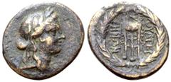 Greek Lydia, Thyateira Æ23. 2nd century BC. Laureate head of Apollo right / ΘΥΑΤΕΙΡΗΝΩΝ, filleted tripod with monogram above; all within wreath. BMC 3; SNG Copenhagen 569. 8.00g, 23mm, 12h. Very Fine.