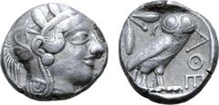 Greek Attica, Athens Fourée Tetradrachm. Circa 405 BC. Head of Athena right, in crested Attic helmet ornamented with three olive leaves above visor and spiral palmette on bowl, wearing round earring w