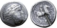 The Hermann Lanz Collection Celts in Eastern Europe AR Tetradrachm. Unfaithful legend type. Imitating Philip II of Macedon. Circa 3rd century BC. Laureate head of Zeus to right / Rider on horseback to