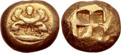 Greek Mysia, Kyzikos EL Stater. Circa 500-450 BC. Double-bodied winged sphinx standing with head facing atop tunny fish to left, wearing ouraios, hair falling in plaited locks behind / Quadripartite i