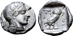Greek Attica, Athens AR Tetradrachm. Circa 454-404 BC. Late "transitional" issue. Head of Athena right, wearing crested Attic helmet ornamented with three olive leaves above visor and spiral palmette 