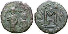 Byzantine Heraclius, with Heraclius Constantine, Æ Nummus. Constantinople, dated RY 3 = AD 612/3. Crowned and draped figures of Heraclius and Heraclius Constantine standing facing, each holding globus