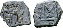 Byzantine Heraclius, with Heraclius Constantine Æ 40 Nummi. Neapolis (Nablas), AD 610-641. Heraclius and Heraclius Constantine both standing facing, each holding globus cruciger, K between heads / Lar