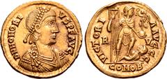 Roman Imperial Honorius AV Solidus. Ravenna, AD 395-423. D N HONORIVS P F AVG, pearl-diademed, draped and cuirassed bust right / VICTORIA AVGGG, emperor standing to right, left foot on captive, holdin