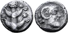 Greek Kyrenaika, Kyrene AR Tetradrachm. Circa 480-460 BC. Silphium plant with two pairs of leaves and five umbels / Head of Zeus Ammon to right; [KYPA] before; all within circular border within shallo