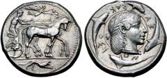 Greek Sicily, Syracuse AR Tetradrachm. Deinomenid Tyranny. Time of Hieron I, circa 475-470 BC. Dies by the Demareteion Master. Charioteer wearing a long chiton and holding a goad in right hand and the