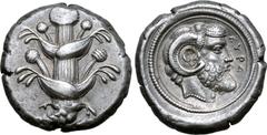 Greek Kyrenaika, Kyrene AR Tetradrachm. Circa 480-435 BC. Silphium plant with two pairs of leaves and five umbels, root below / Head of Zeus Ammon to right; KYPA before; all within circular border for