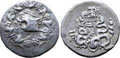 Greek Mysia, Pergamon AR Cistophoric Tetradrachm. Circa 76-67 BC. Serpent emerging from cista mystica; all within ivy wreath / Two serpents entwined around bow and bowcase; TH and monogram above, civi