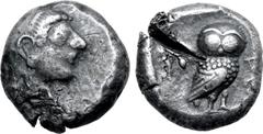 Greek Attica, Athens AR Tetradrachm. Circa 485 BC. Archaic head of Athena right, wearing crested helmet / Owl standing to right with head facing, olive sprig behind, ΑΘΕ before; all within incuse squa