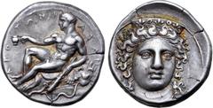 Greek Bruttium, Kroton AR Stater. Circa 390-380 BC. Head of Hera Lakinia three-quarters facing, turned slightly to right, wearing low polos ornamented with palmettes / Youthful Herakles seated left on