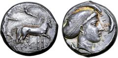 Greek Sicily, Syracuse AR Tetradrachm. Time of the Second Democracy, circa 420 BC. Signed by the unknown master 'A'. Charioteer, holding kentron and reins, driving slow quadriga to right; above, Nike 