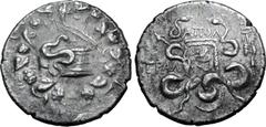 Greek Lydia, Tralleis AR Cistophoric Tetradrachm. Apol-, magistrate. Circa 140-135 BC. Serpent emerging from cista mystica; all within ivy wreath / Two serpents entwined around bow and bowcase; ΑΠΟΛ a
