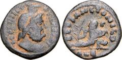 Roman Imperial Time of Maximinus II Æ 16mm. Alexandria, AD 310-313. DEO SANCTO [SARAPIDI], draped bust of Serapis to right, wearing modius / DEO SANCTO NILO, Nilus reclining left, holding branch and c