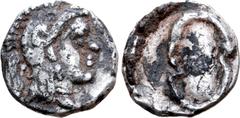 Greek Boiotia, Thebes AR Obol. Circa 387-374 BC. Boiotian shield / Helmeted head of Athena right. BCD Boiotia 174 (part lot); Traité 284, pl. CCII, 24. 0.61g, 10mm. Very Fine. Extremely Rare; only two